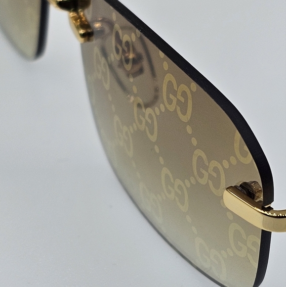 GUCCI UNISEX GG1221S 004 GUCCI RIMLESS GG LOGO ON LENS SUNGLASSES - Picture 12 of 16